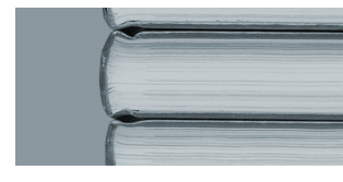 three books viewed from the side stacked